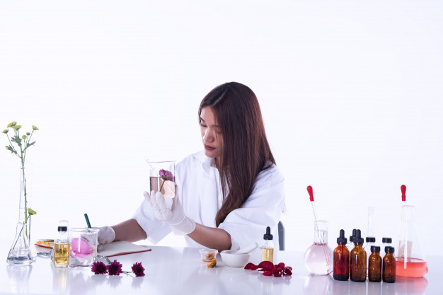 a female biotechnology student working in lab