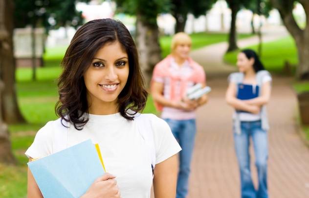 an indian woman student looking at camera