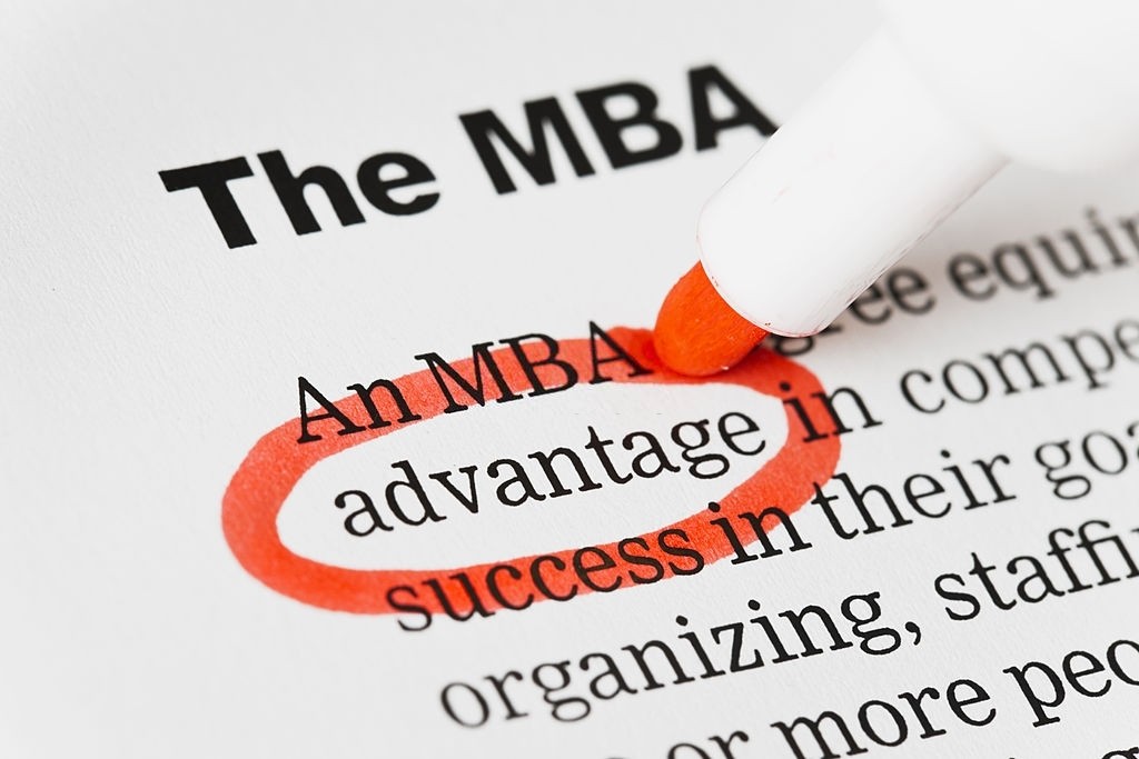 Red pen circles advantage in document headed MBA