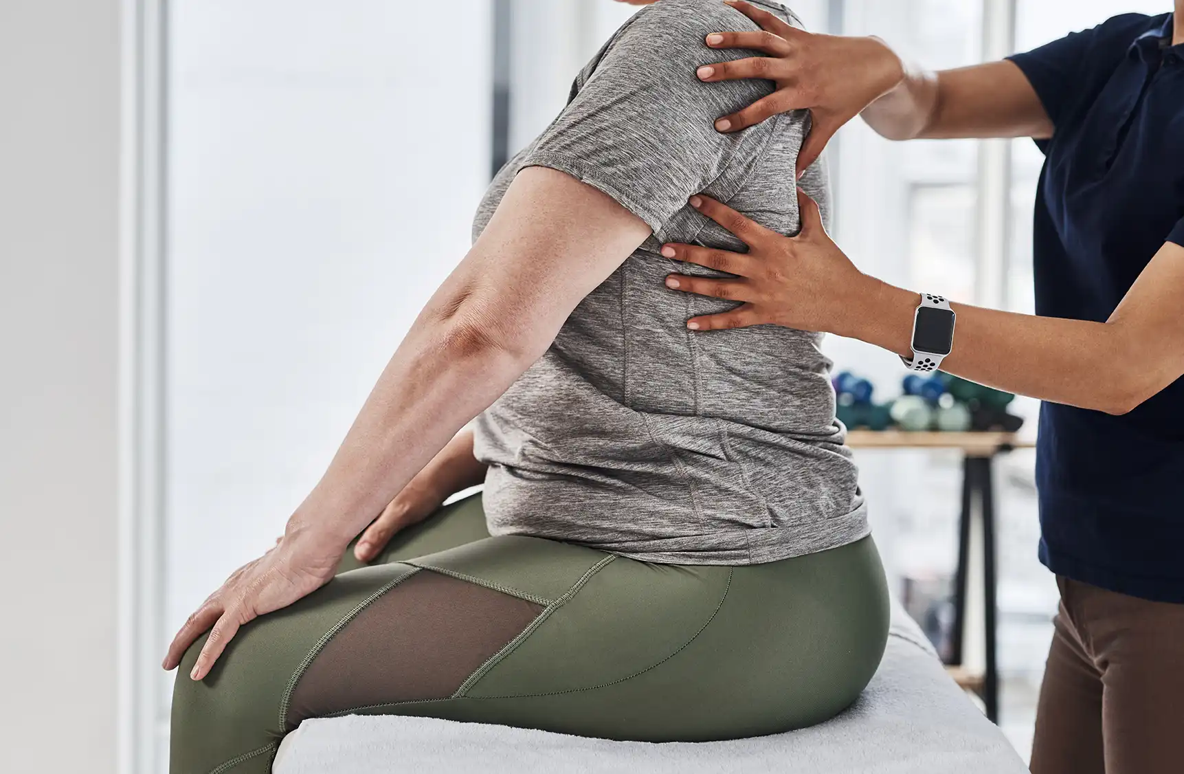 woman getting her back physiotherapy