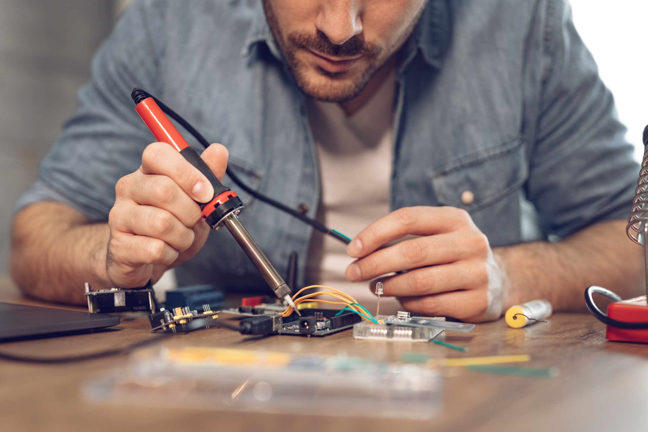 Engineer Working On Circuit Board